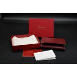 Cartier calf skin leather credit card wallet embossed with makers logo to centre,and with gold