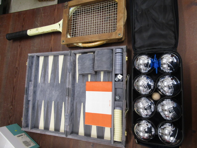 a backgammon set, Boules and vintage racket