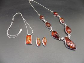 Sterling silver and amber necklace, plus an amber pendant and clip on earings