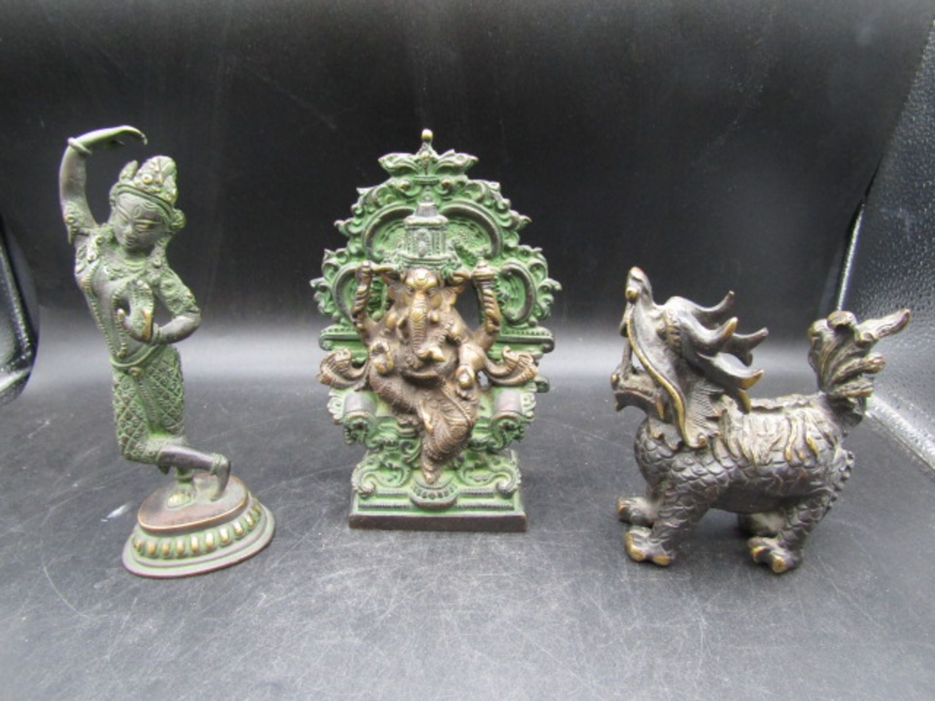 Bronze?  Ganesha, priestess and foo dog