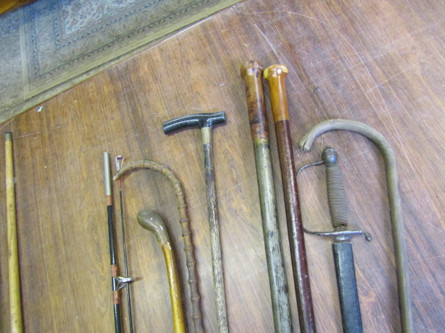 Various walking canes/sticks, a sword and a fishing rod - Image 2 of 6