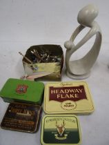 Vintage tins 'soapstone' figure and a box of vintage lace bobbins