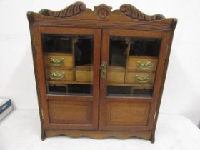An oak smokers cabinet 55cmW 19cmD 60cmH