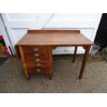 1930's George V extending single pedestal oak desk stamped G. R .V with 5 drawers and brass cup