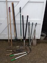 Garden tools to include hoes and rakes etc