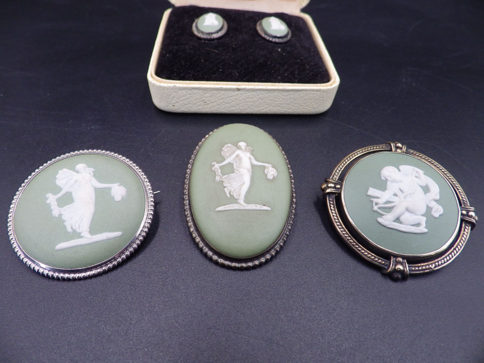 3 Wedgwood sage Jasperwear and silver brooches and a pair of clip on earings in their original box. - Image 2 of 4