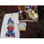 vintage teddies and a Noddy rug in a suitcase