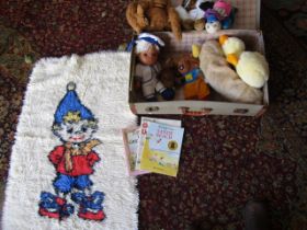 vintage teddies and a Noddy rug in a suitcase