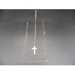 9ct gold cross on chain 6.08g plus a 9ct gold bracelet, and 2, 9ct gold necklaces 1.51g - total