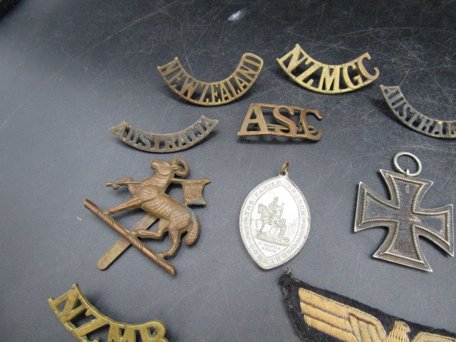 WW2 iron cross and various insignia badges and patches plus a charm bracelet - Image 3 of 9