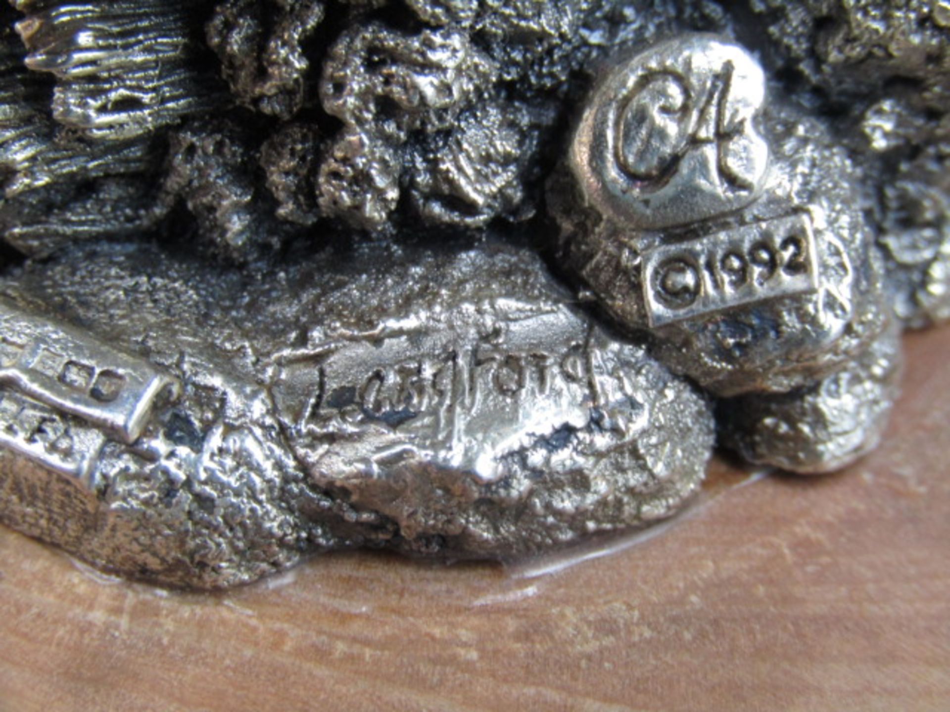 A silver owl on a wooden plinth, stamped with hallmarks and 'Langford  CA 1992' on the base 12cmH - Image 4 of 6