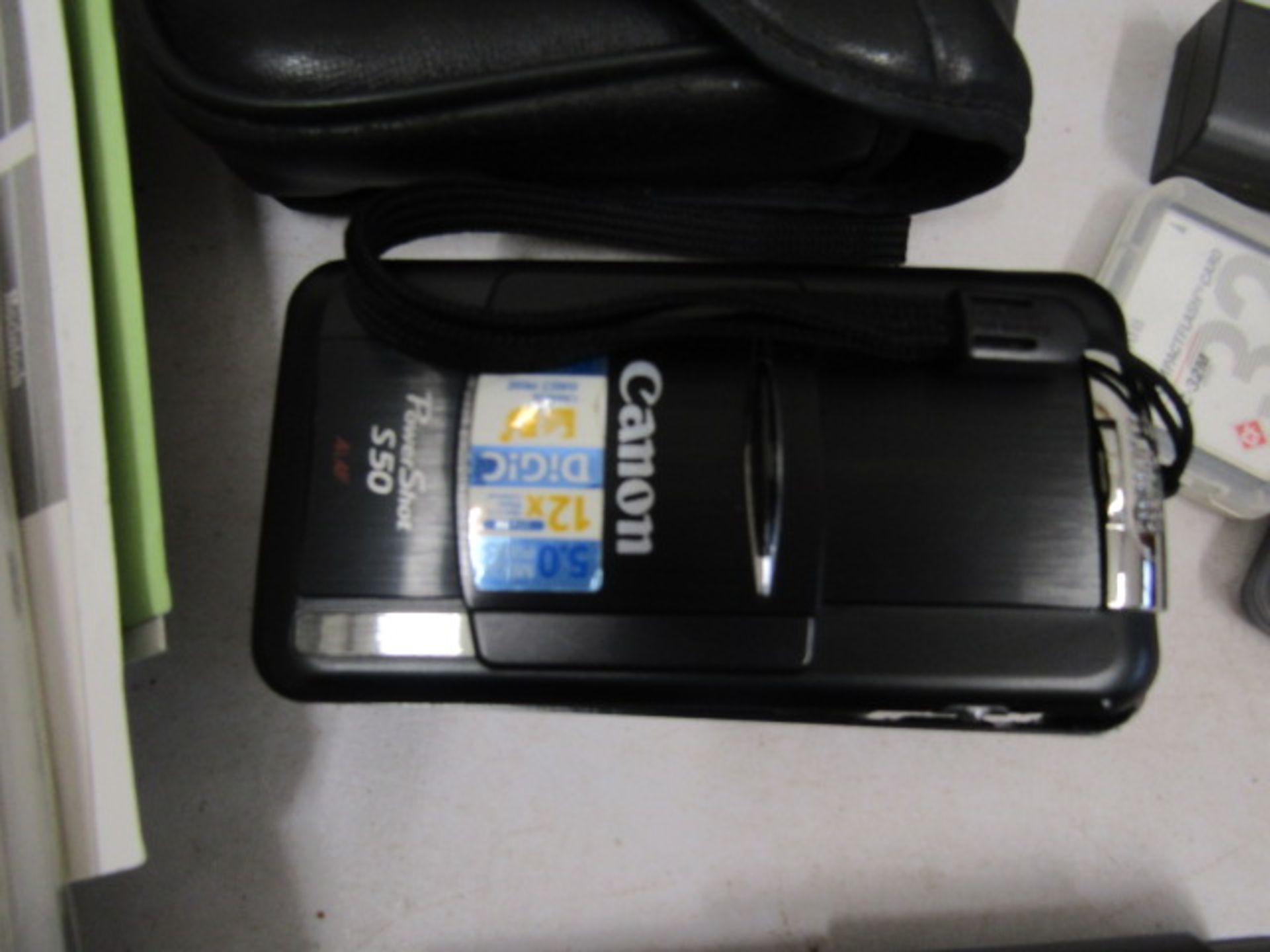 Canon camera with batteries, charger, memory cards plus a Miranda tripod - Image 2 of 8