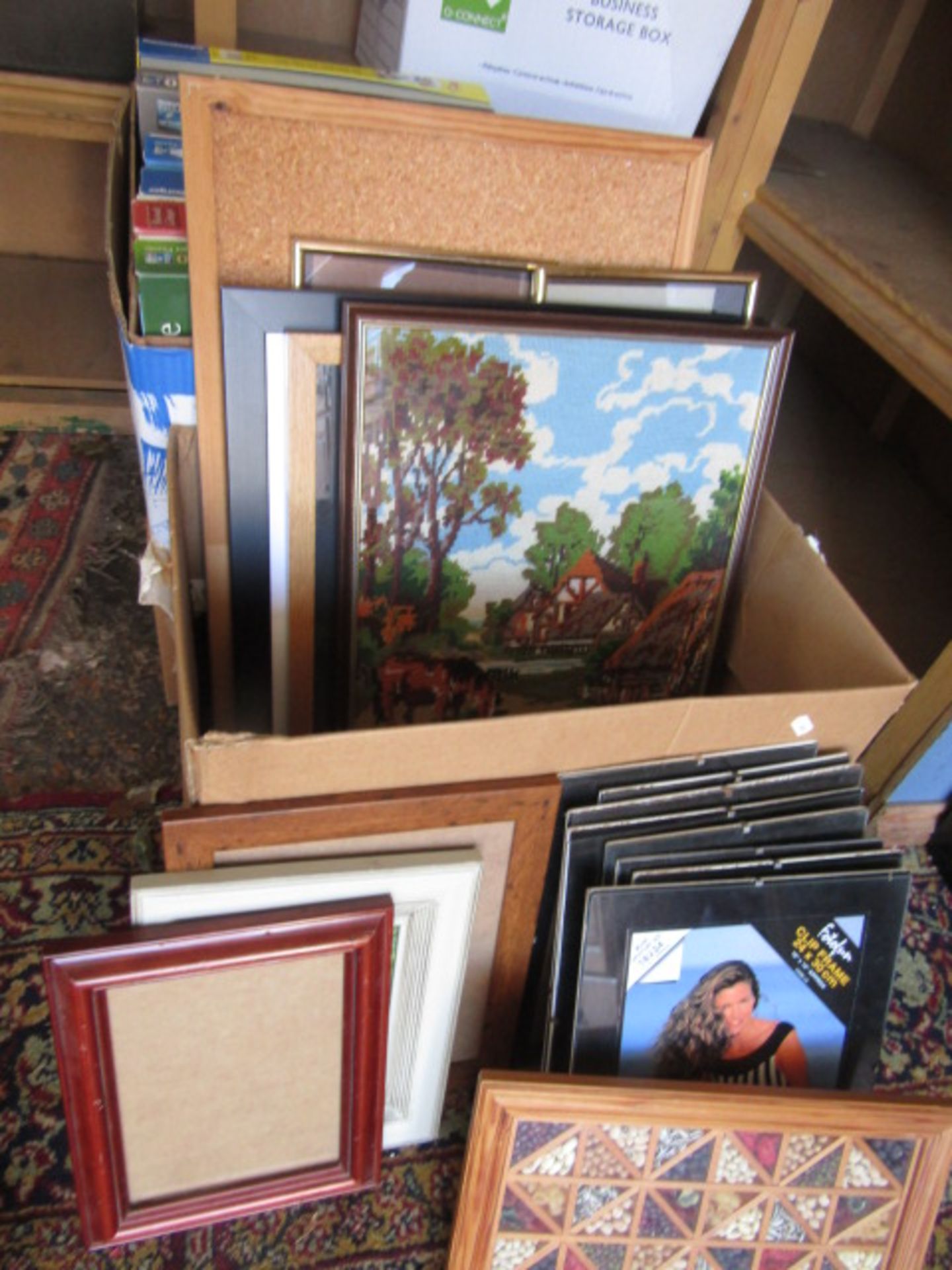 A box picture frames and a tapestry