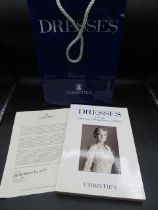 Christies auction catalogue for the sale of dresses worn by Princess Diana held in New York 1997,