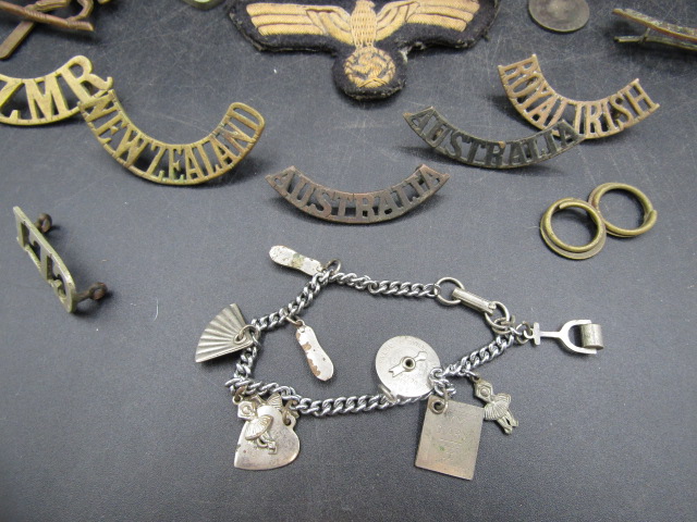 WW2 iron cross and various insignia badges and patches plus a charm bracelet - Image 2 of 9