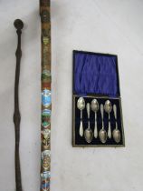 A souvenir badge walking stick, cased epns teaspoons and a vintage poker