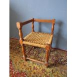 Corner chair with rush seat