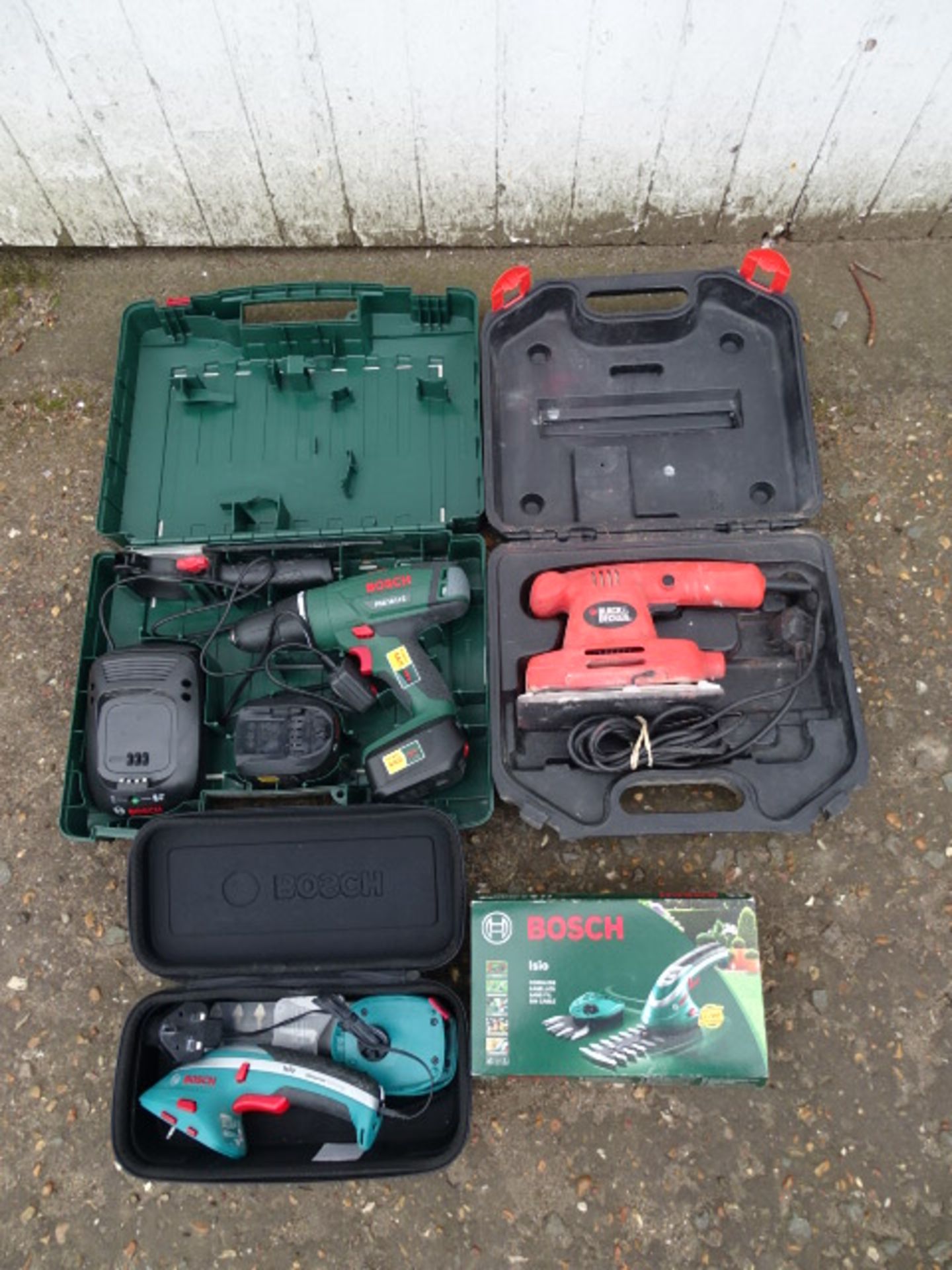 Bosch cordless lithium drill, garden trimmer and Black & Decker sander, all from a house clearance