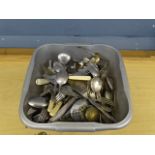 Tub of unsorted cutlery