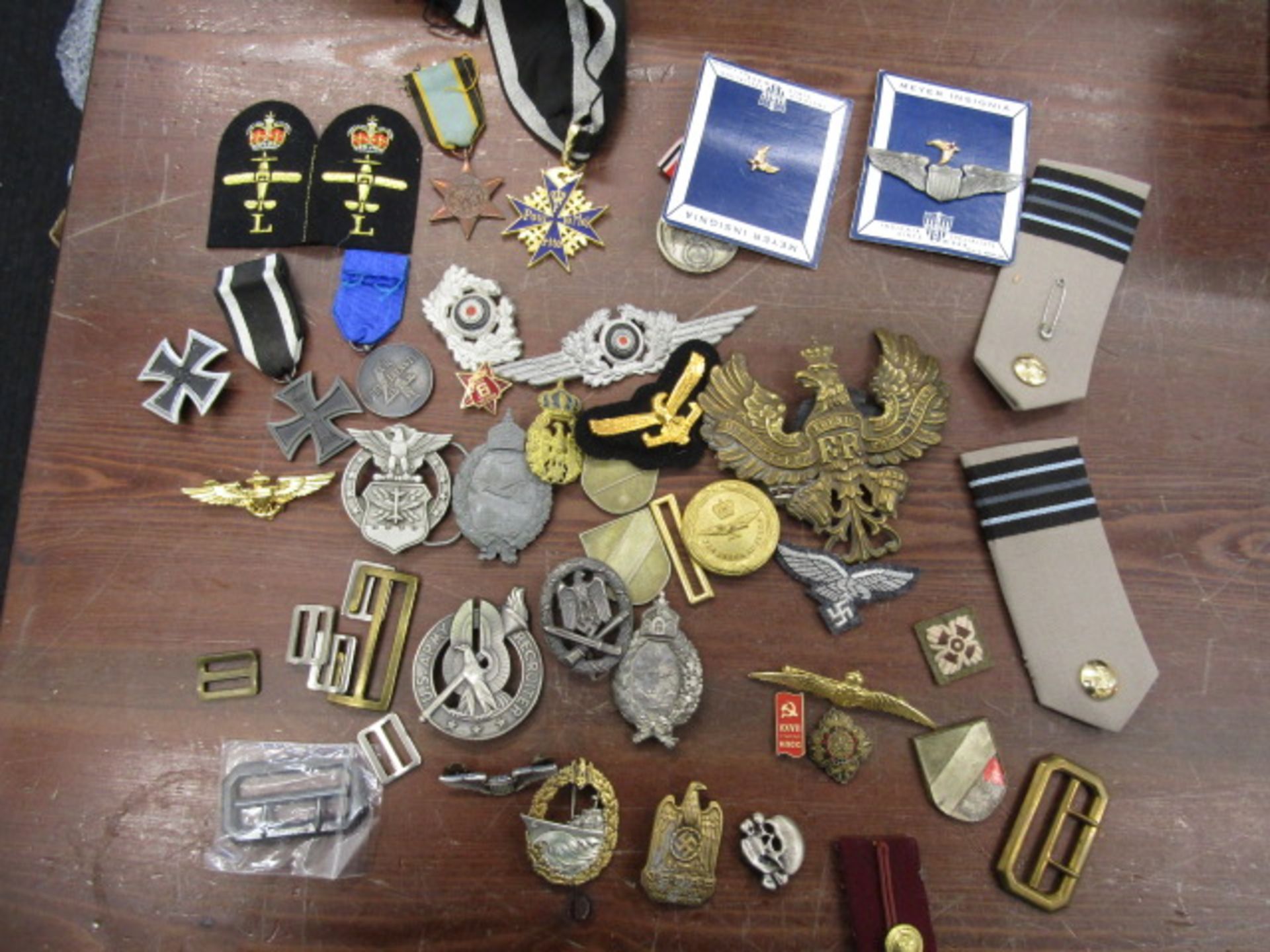 ** description change* Various Military insignia most REPRO