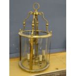 A brass cylinder hanging lantern with all glass intact H70cm Diameter 37cm approx