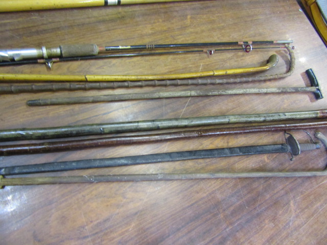 Various walking canes/sticks, a sword and a fishing rod - Image 3 of 6