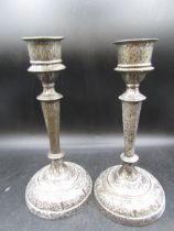 A pair bronze? inlaid Islamic? candlesticks  one needs repair
