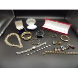 collection of costume jewellery to inclue a rolled gold bangle, 925 silver and MOP bracelet, and a