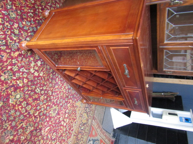 A sideboard with wine rack and glazed cupboards 107cmW 42cmD 84cmH - Image 2 of 2