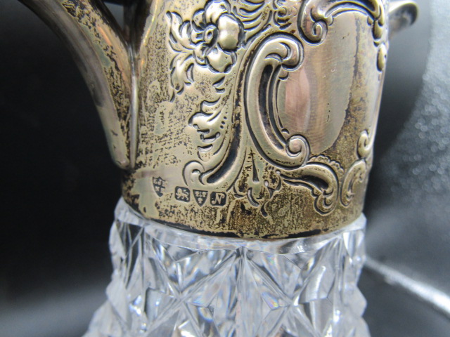 A cut glass silver embossed collar claret jug, hallmarked Chester 1913 Haseler Brothers - Image 2 of 2