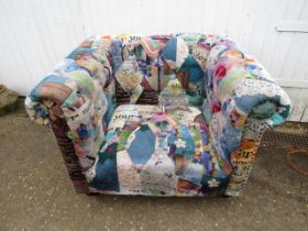 A velour patchwork style club chair in buttoned Chesterfield style  some slight plucks to upholstery