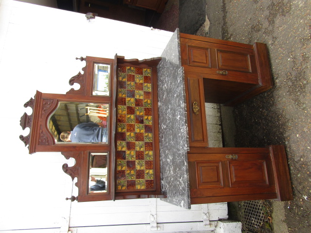 Antique  marble topped washstand with tiled and mirrored back