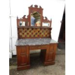 Antique  marble topped washstand with tiled and mirrored back