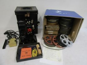Pathescope H,9.S projector in original case with key and instruction book along with a box 30 9.5
