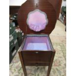 A sewing cabinet with material interior