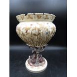 A vintage continental footed bowl with fish stem detail and bulrush reeds with gilded flowers 22cmH