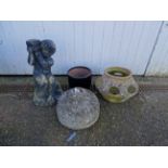 Garden pots, statue and concrete parasol base