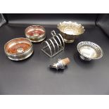 A pair of matching silver wine coasters - London 1997, by John Bull Ltd, a silver toast rack -