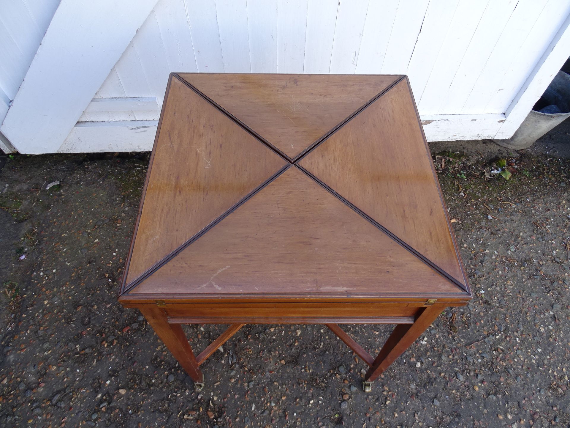 19th Century mahogany envelope card table with drawer on brass castors H70cm Top 56cm x 56cm approx - Image 2 of 10