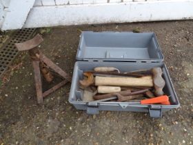 Toolbox with tools to include hammer and spanners and an axle stand