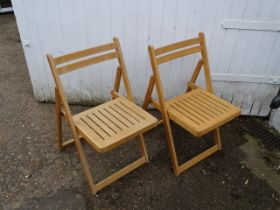 2 Folding wooden chairs