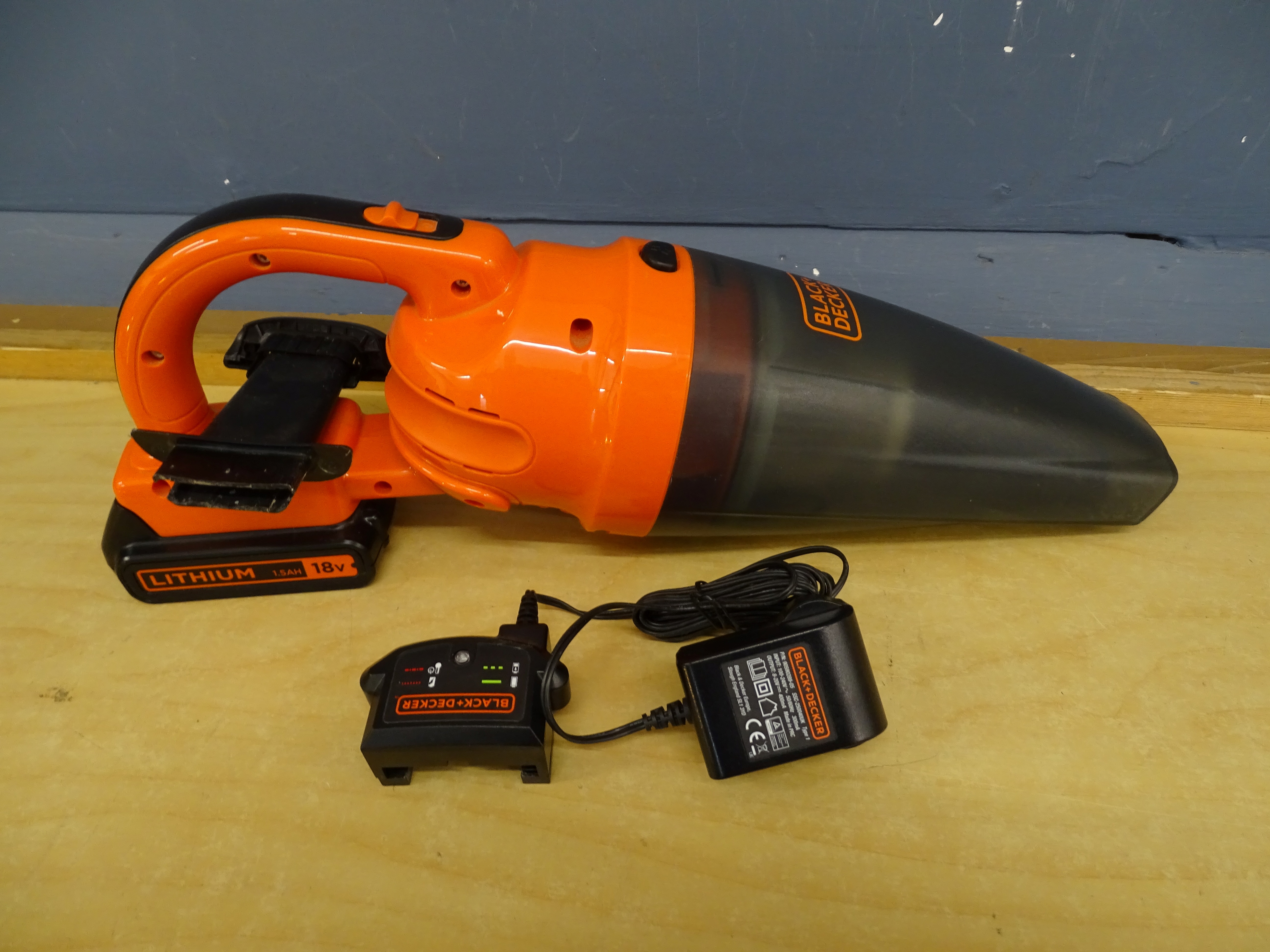 Black & Decker cordless lithium battery handheld vacuum cleaner with battery and charger in