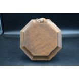 Mouseman - an oak octagonal cheeseboard / pot stand with a mouse signature, by the workshop of