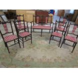 An Edwardian salon suite comprising 4 dining chairs, 2 carver chairs and a 2 seat 'sofa'