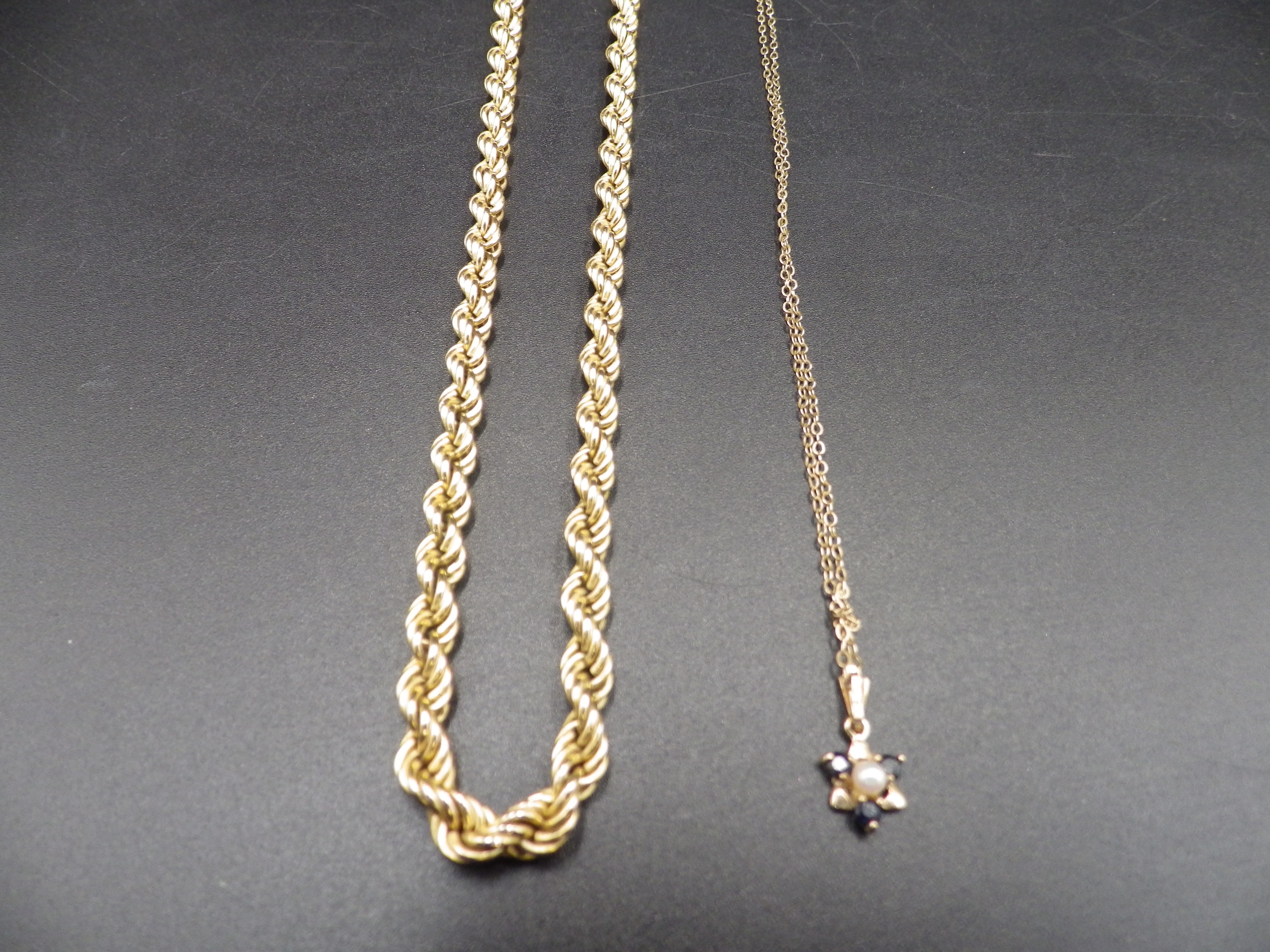 9ct Italian gold necklace 8.70g and a 9ct gold necklace with a pearl and sapphire pendant. 1.10g - Image 2 of 2