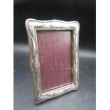 A silver fronted photo frame 12x17cm