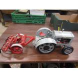 Case model tractor with spring cultivator