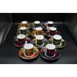 11 tartan coffee cans with saucers to include 6 Royal Crown Duchy and 5 Fox