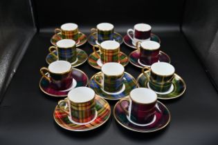 11 tartan coffee cans with saucers to include 6 Royal Crown Duchy and 5 Fox
