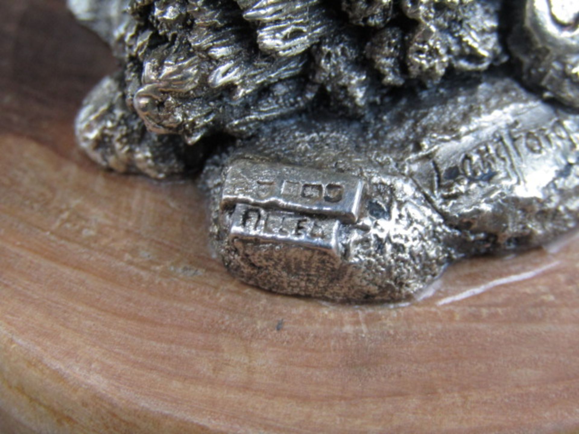 A silver owl on a wooden plinth, stamped with hallmarks and 'Langford  CA 1992' on the base 12cmH - Image 3 of 6